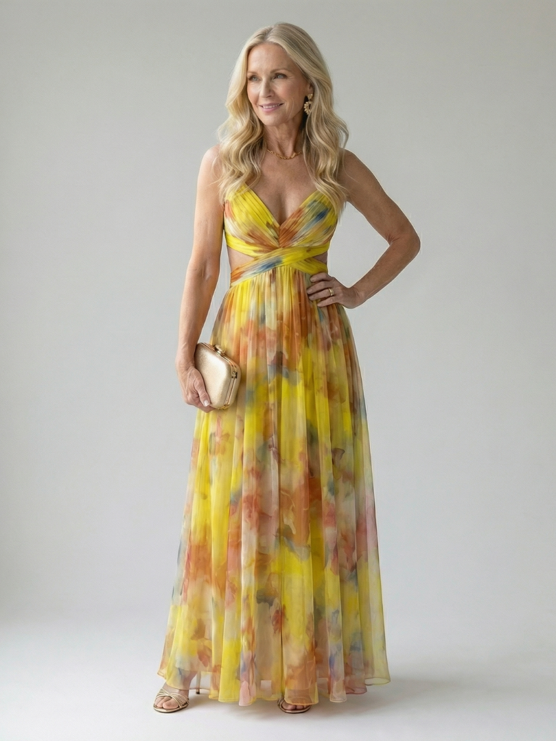 Soft wrap maxi dress with bright yellow and orange watercolor print, sleeveless V-neck