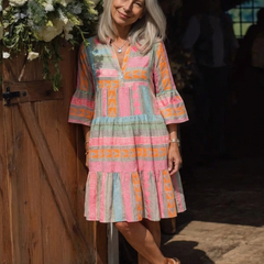 Geometric print tiered knee-length dress with multicolor pink, orange, teal panels