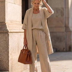 Beige women's elegant set: short-sleeve cardigan over matching wide-leg pants