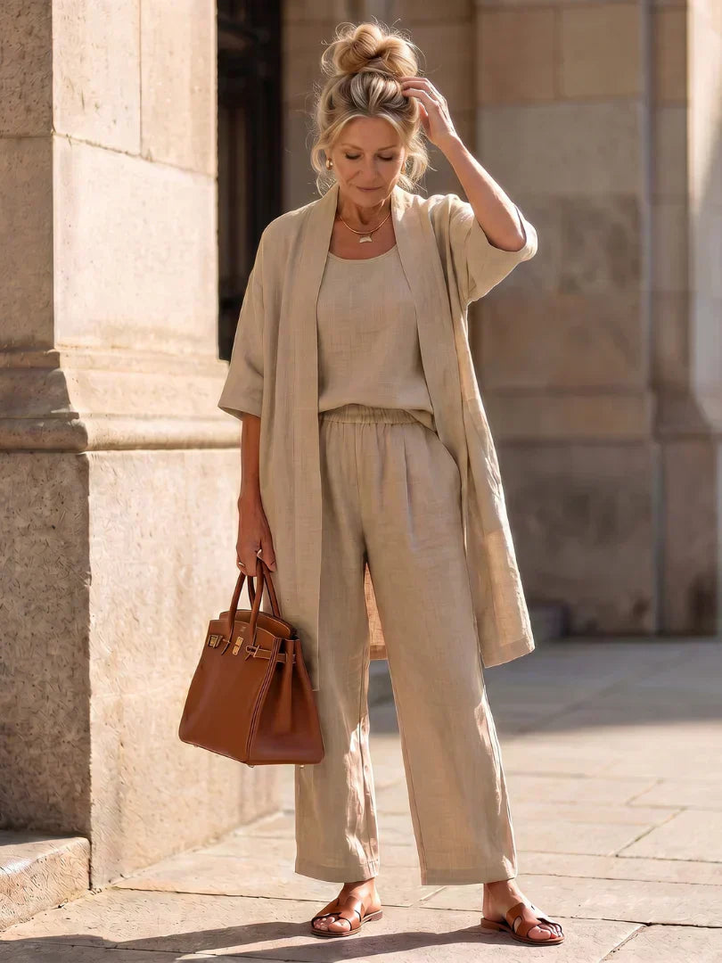 Beige women's elegant set: short-sleeve cardigan over matching wide-leg pants