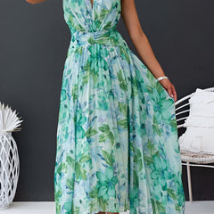 Floral halter midi dress in aqua and teal floral print with flowing tiered skirt
