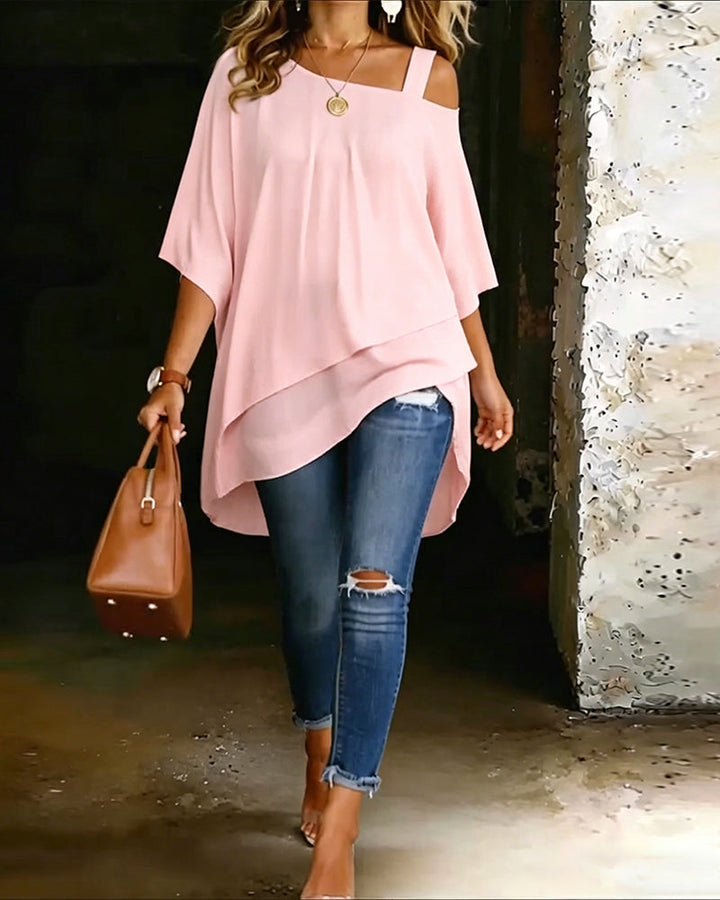 Pink asymmetric blouse with wide square neckline and draped hi-lo hem