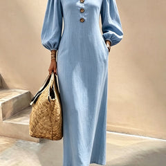 Blue v-neck maxi dress with button front and lantern sleeves