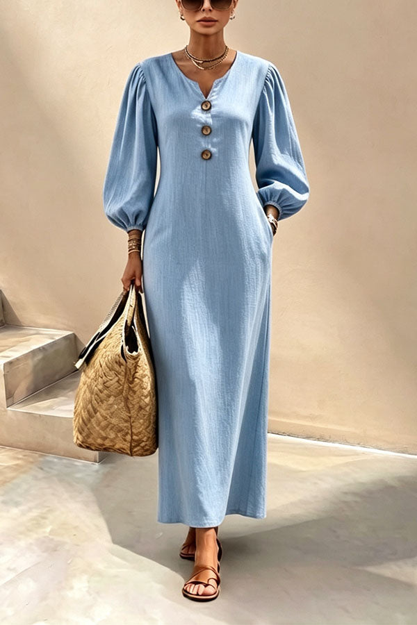 Blue v-neck maxi dress with button front and lantern sleeves