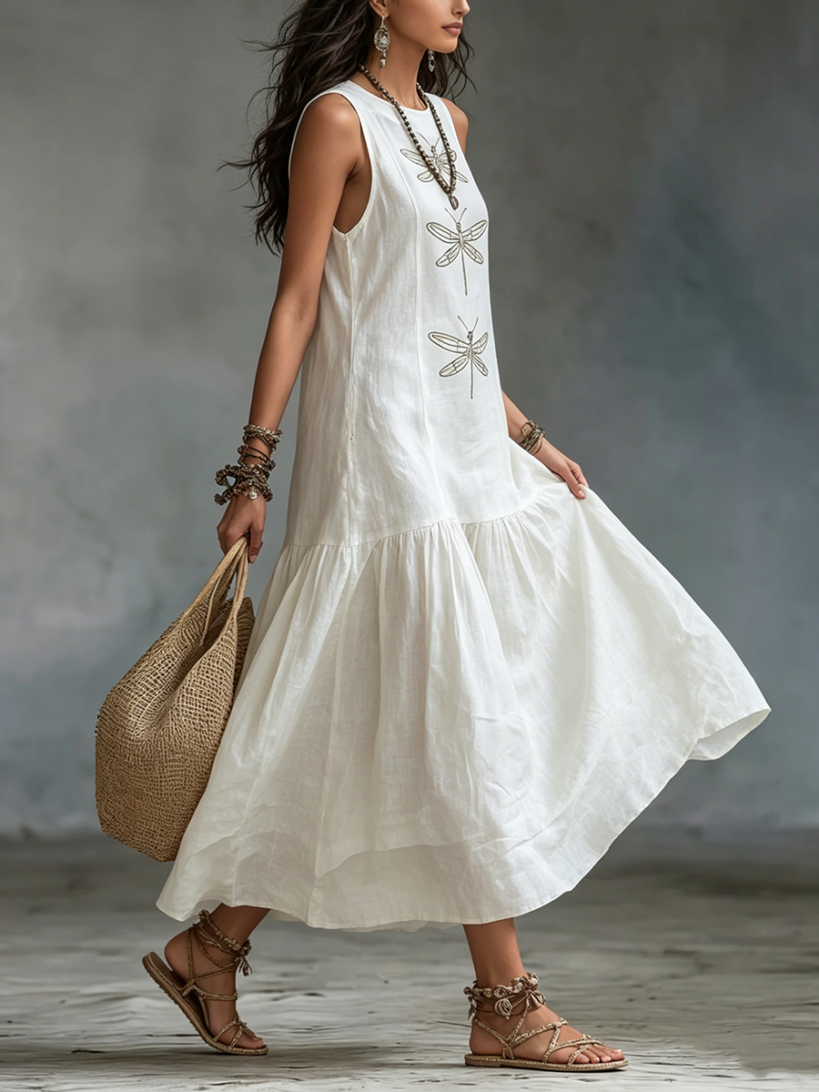 White sleeveless maxi dress with dragonfly embroidery and layered tiered hem