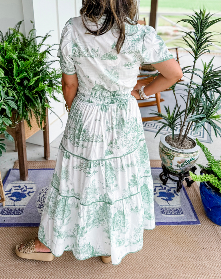 Tiered V-neck maxi dress in white with subtle green toile pattern, short sleeves