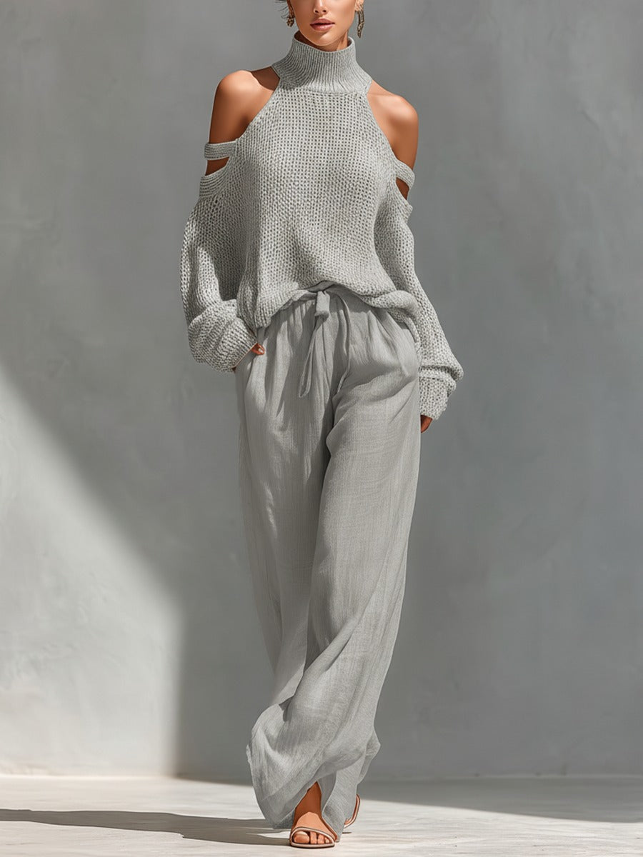 Light gray cold-shoulder knit turtleneck top with matching drawstring trousers