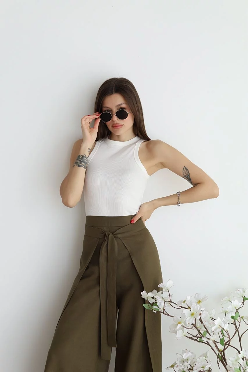 Olive green high-waist wide-leg trousers with front tie and soft drape