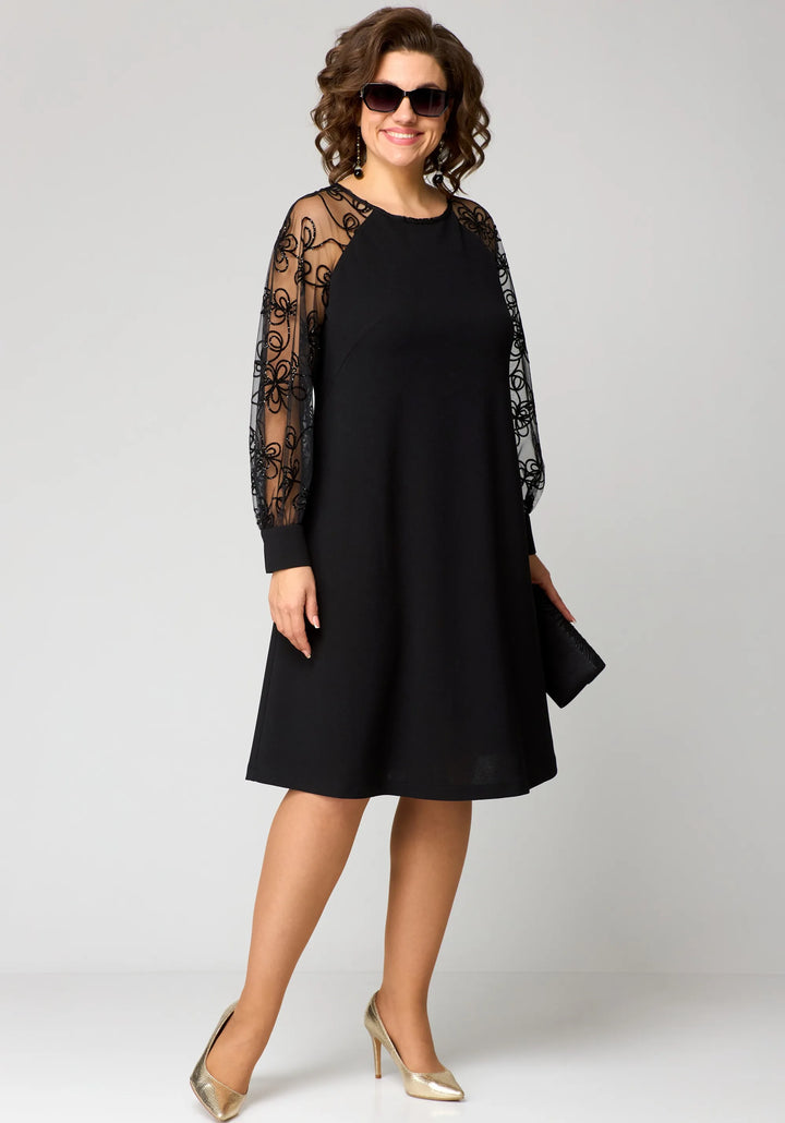Black midi dress with sheer lace sleeves and straight A-line skirt.