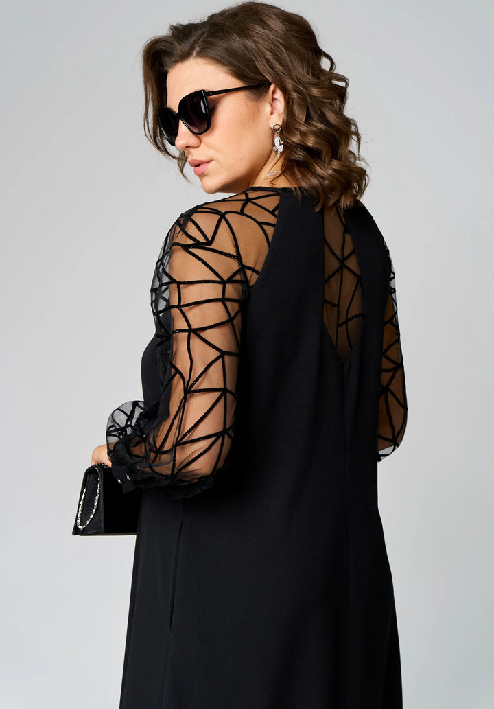 Black tunic dress with sheer mesh sleeves and long cuffed arm coverage