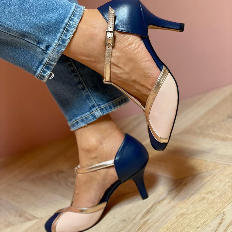 Dark blue heeled sandals with ankle strap, pointed toe, and metallic trim