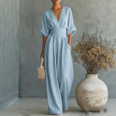 Women’s wide-leg jumpsuit in light blue with V-neck and wide-leg drape