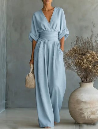 Women’s wide-leg jumpsuit in light blue with V-neck and wide-leg drape