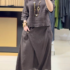 Brown two-piece outfit: long-sleeve tunic and gathered midi skirt with pockets