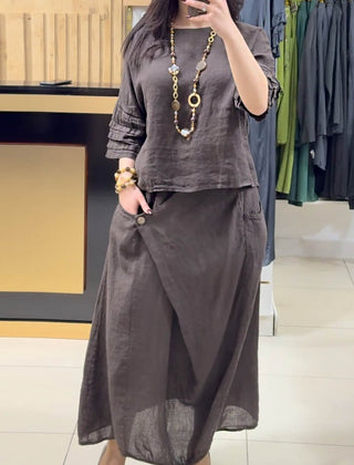 Brown two-piece outfit: long-sleeve tunic and gathered midi skirt with pockets
