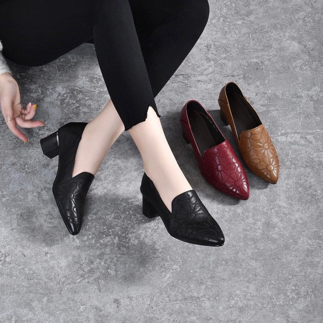 Black embroidered leather pumps with pointed toe and low block heel