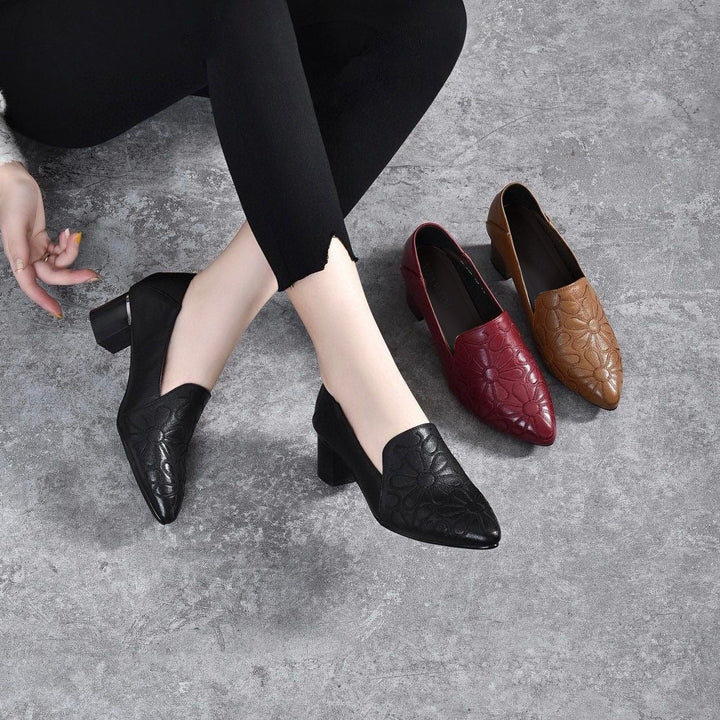 Black embroidered leather pumps with pointed toe and low block heel