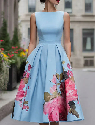 Light blue sleeveless midi dress with fitted bodice, pleated full skirt and pink floral panels