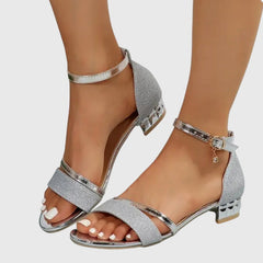 Orthopedic heeled sandals with silver glitter straps, open toe, and gold-tone block heel