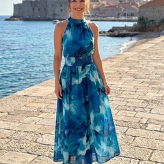 Blue abstract print gathered-waist midi dress with halter neckline, full length