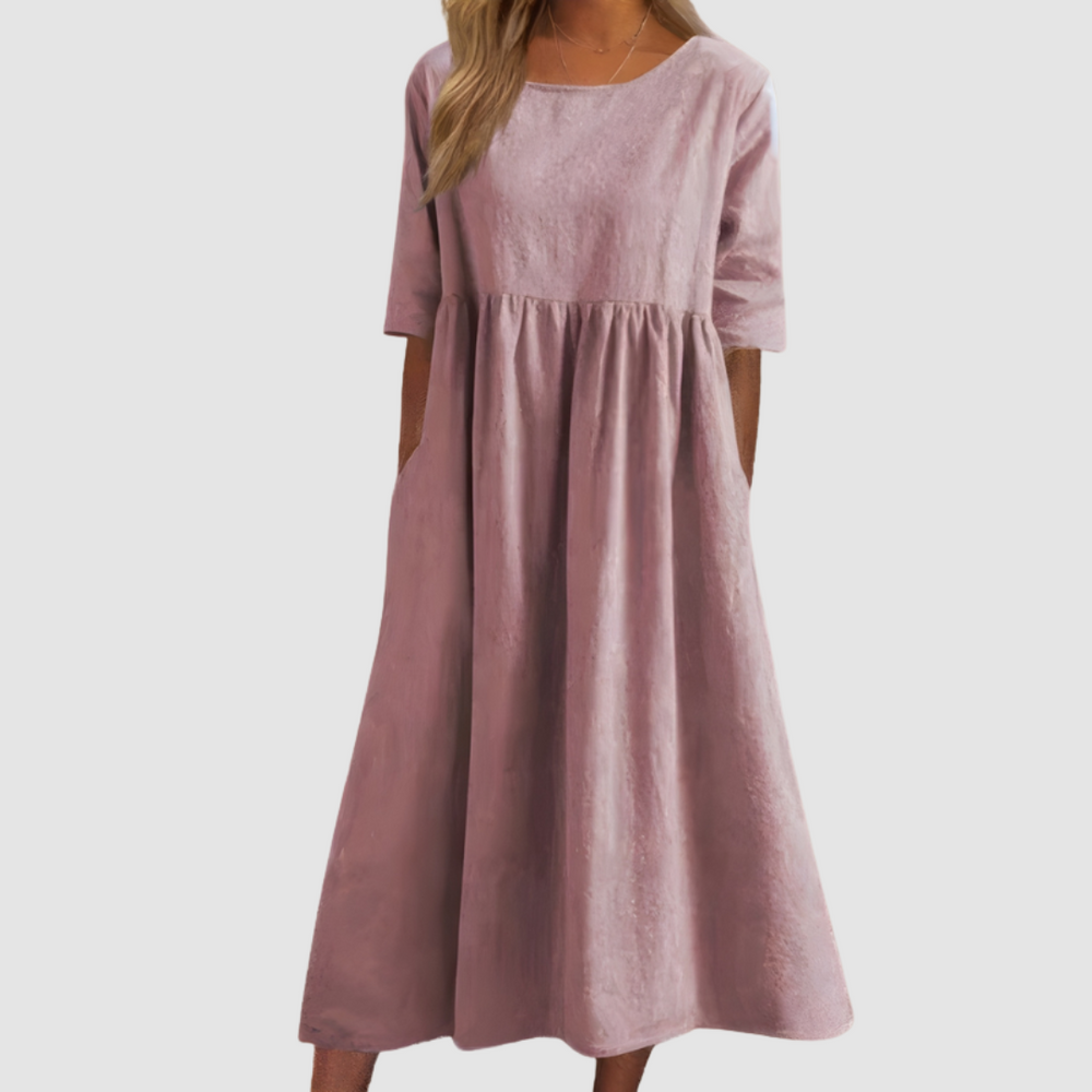 Mauve pink breezy dress with gathered waist, short sleeves, and flowy A-line skirt