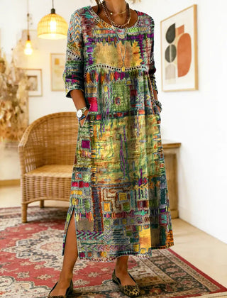 Blue-toned multicolor patchwork ethnic dress with 3/4 sleeves and round neckline, slit