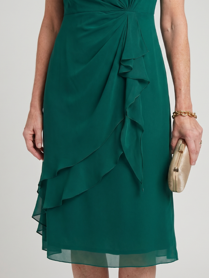 Teal midi dress close-up of draped knot front and layered side ruffles