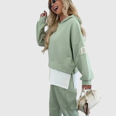 Green hooded sweatshirt and jogger set with white layered underpiece