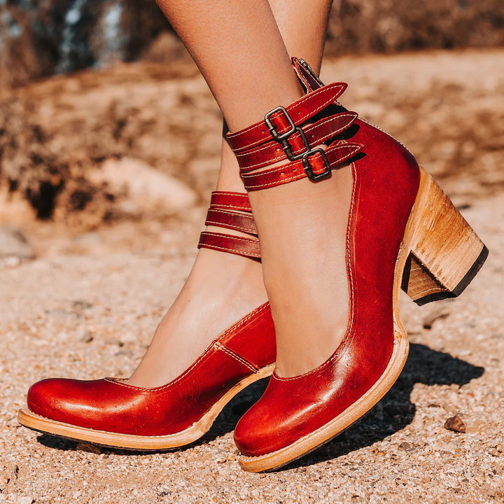 Red ankle strap sandals with stacked block heel and double buckle closure