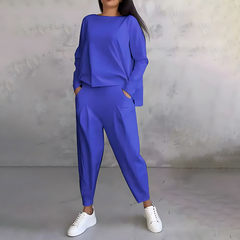 Blue two-piece lounge set with long-sleeve sweatshirt and tapered ankle jogger pants