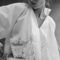 White V-neck lace blouse with scalloped embroidered front panel and loose puff sleeves