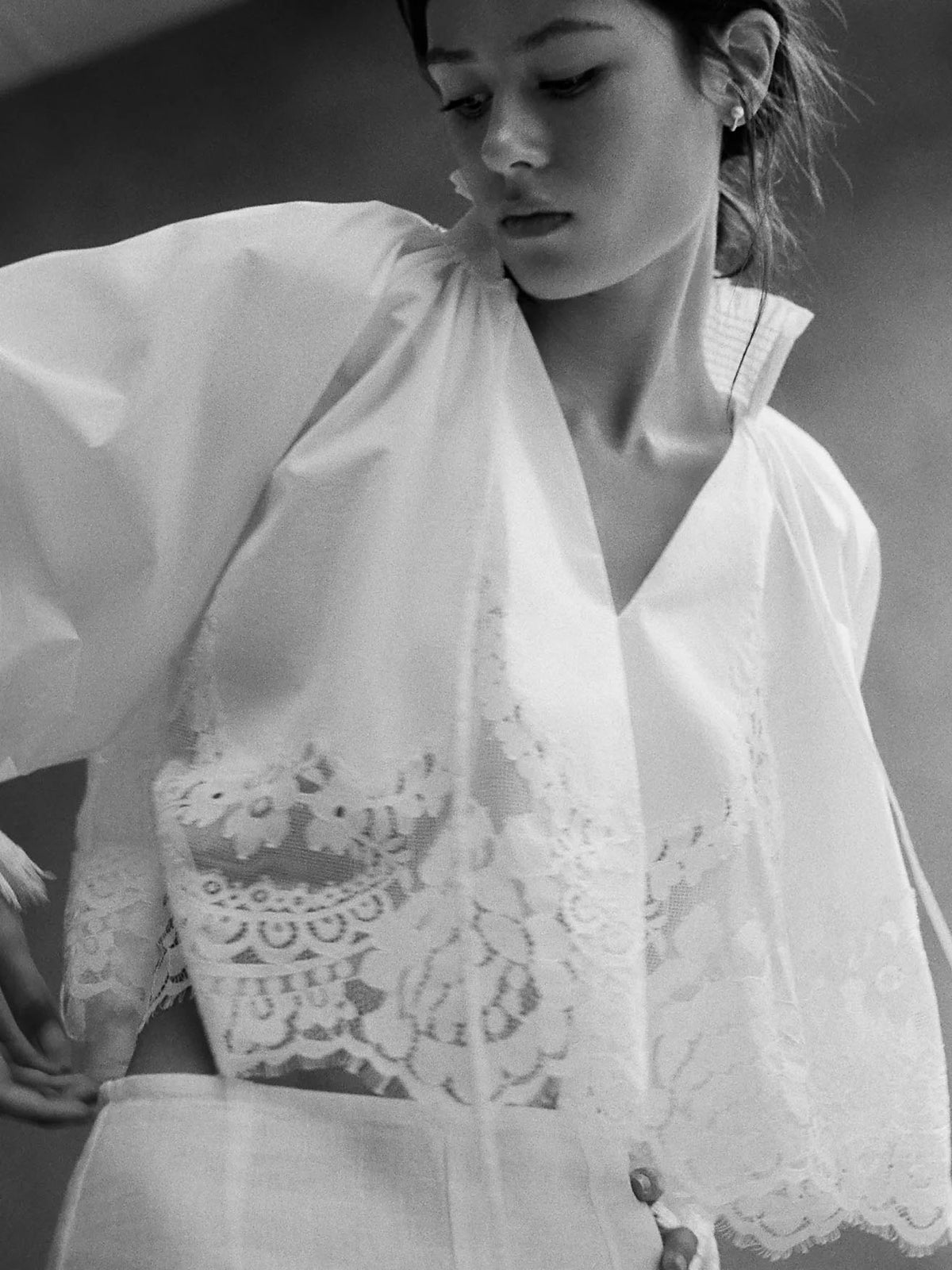 White V-neck lace blouse with scalloped embroidered front panel and loose puff sleeves