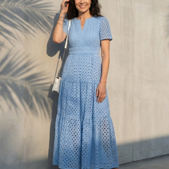 Sky blue V-neck tiered midi dress with short sleeves and eyelet dot texture