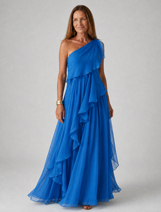 Blue one-shoulder maxi dress with layered ruffles and airy chiffon skirt