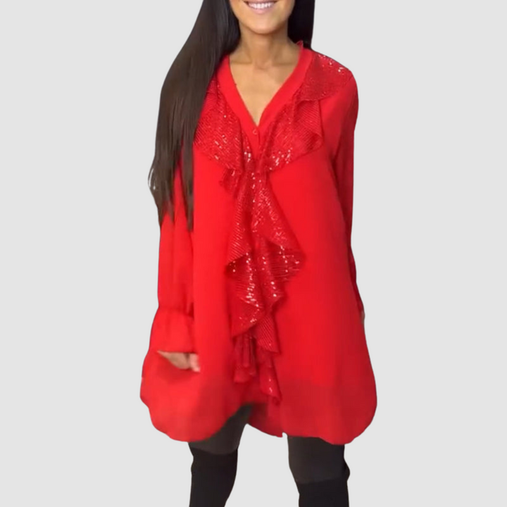 Red ruffled blouse with long sleeves and glittery sequin front