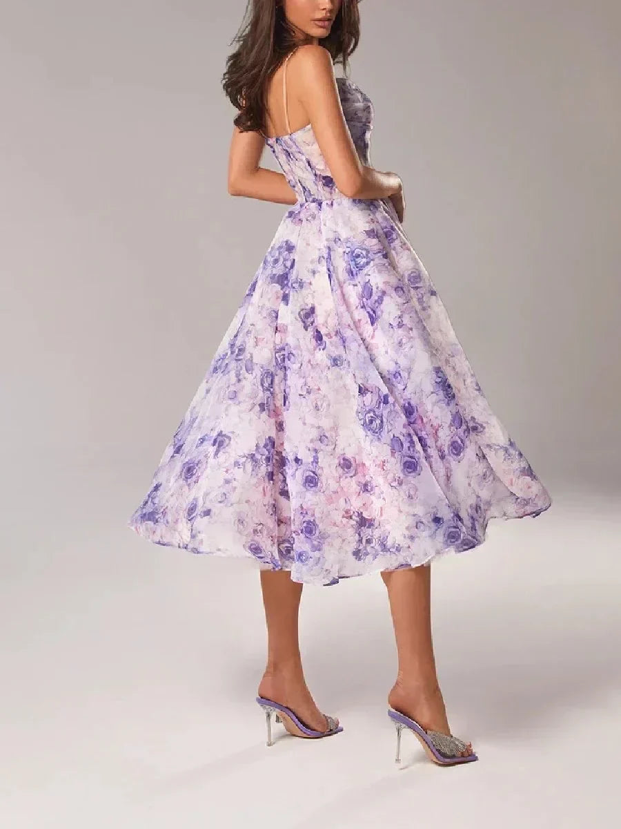 Violet floral print strapless dress with fitted bodice and full midi skirt