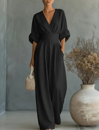 Women’s wide-leg jumpsuit in black with V-neck and elastic waist