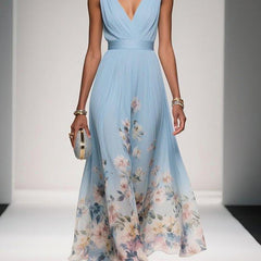 Light blue sleeveless V-neck floral print wrap dress with flowing skirt