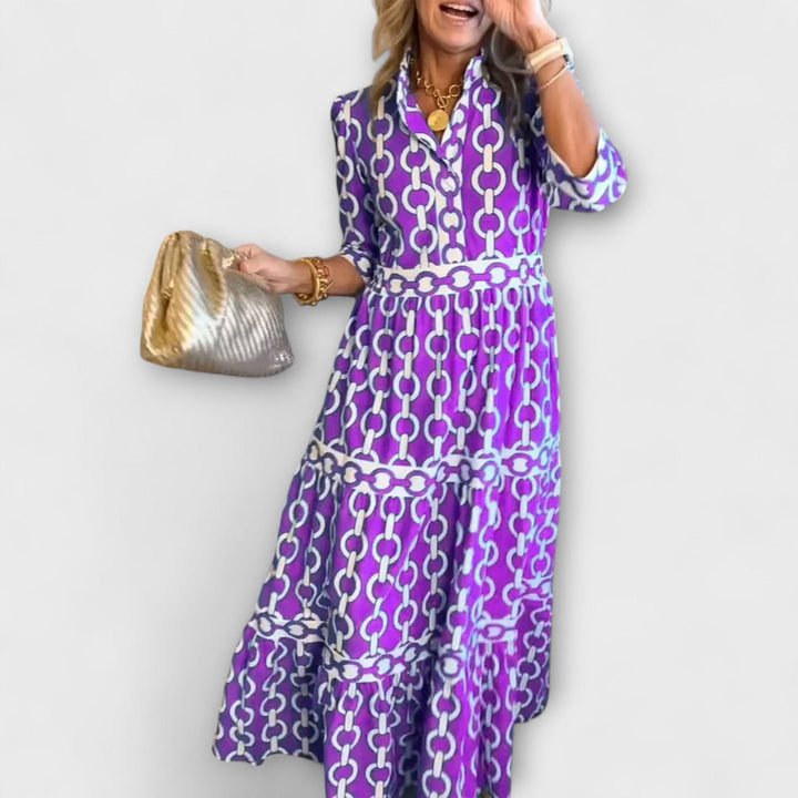 Purple chain-print midi dress with short sleeves and tiered skirt