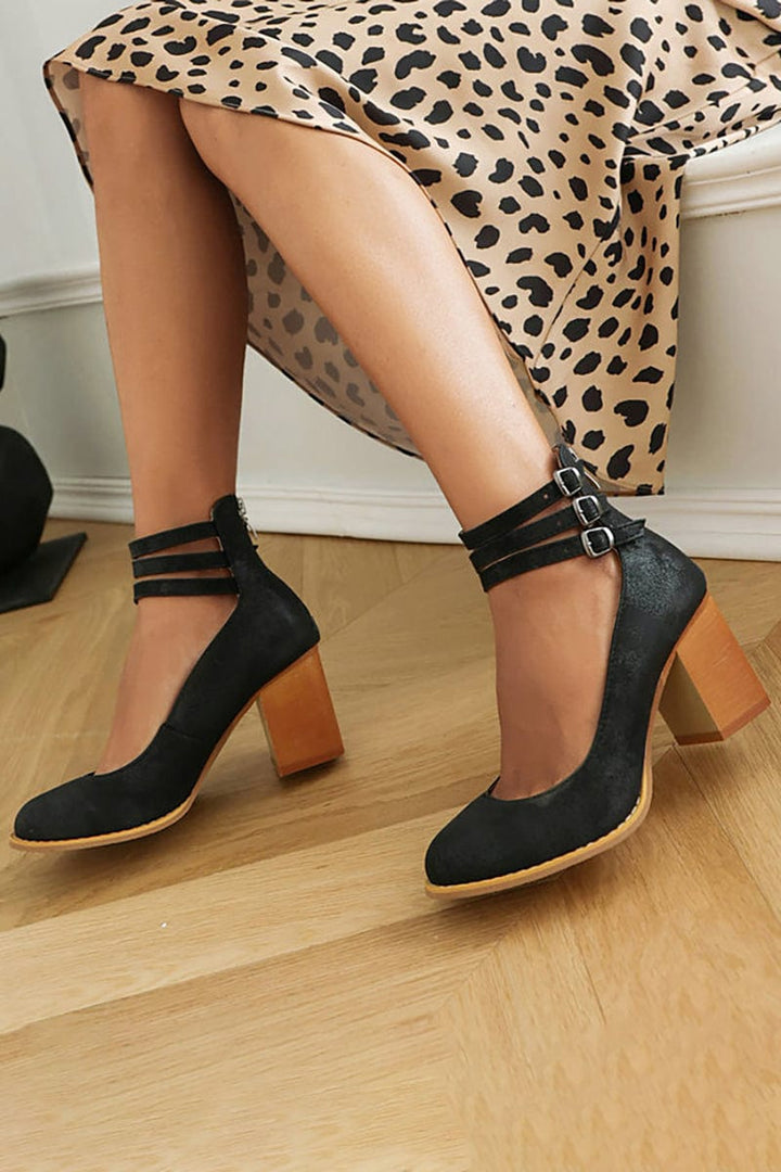 Kallie two-buckled strap ankle heels in black with chunky block heel