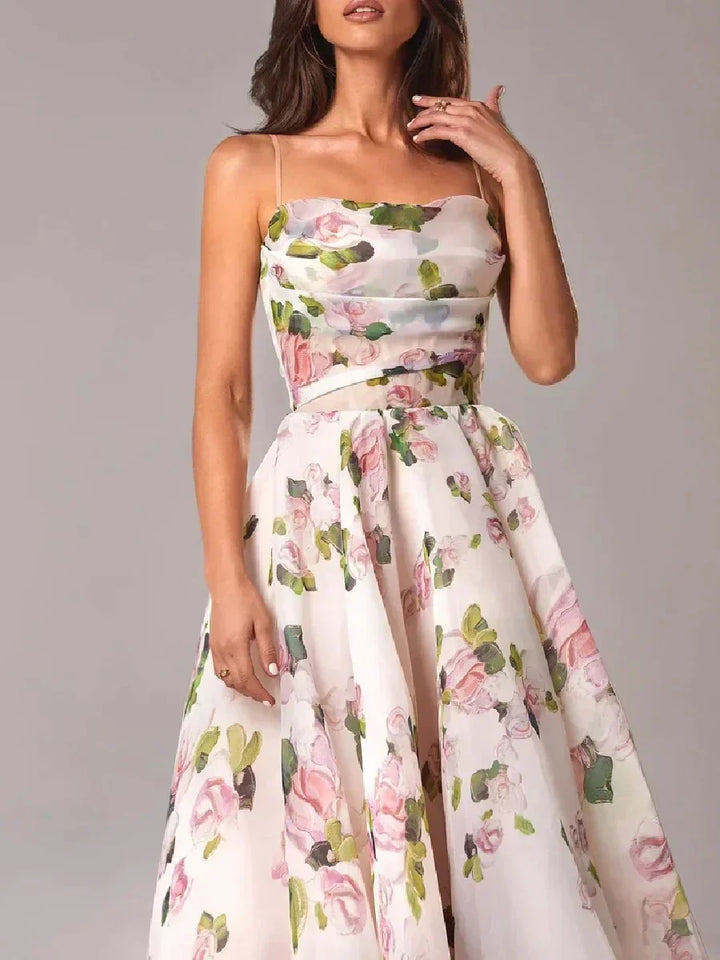 White floral print strapless dress with gathered waist and full midi skirt