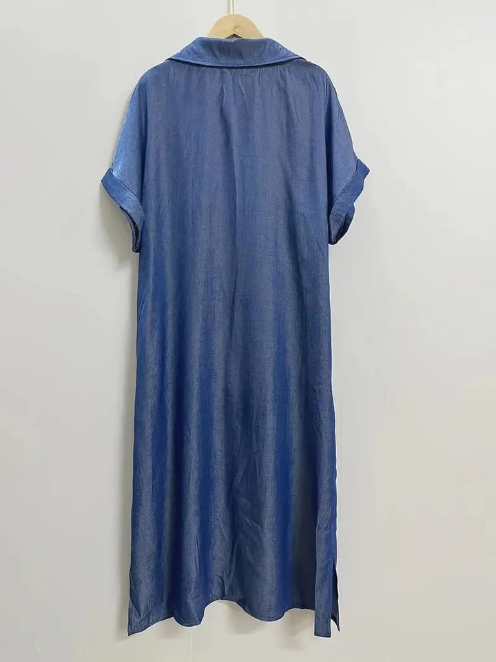 Blue shirt dress back view with short sleeves and loose A-line hem