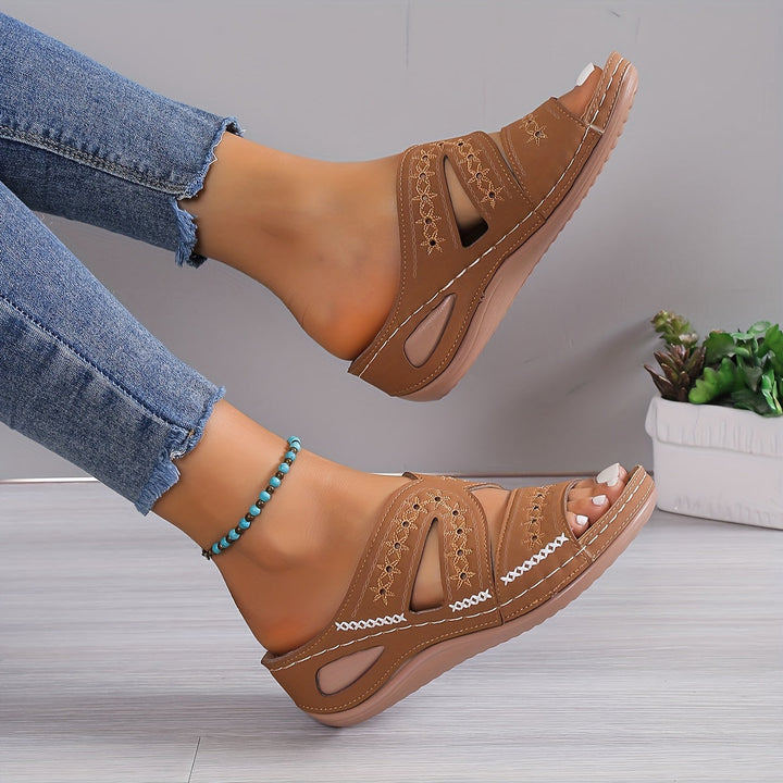 Brown orthopedic casual sandals with ankle strap and stitched cutout upper