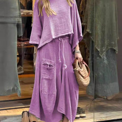 Sabrina set in purple: draped tunic top with wide neckline and maxi skirt with patch pockets