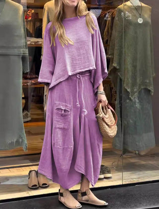 Sabrina set in purple: draped tunic top with wide neckline and maxi skirt with patch pockets