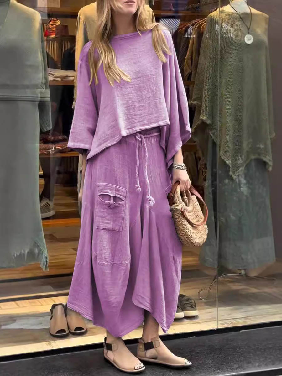 Sabrina set in purple: draped tunic top with wide neckline and maxi skirt with patch pockets