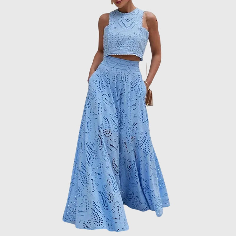 Blue two-piece set with sleeveless lace crop top and full midi skirt