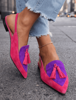 Pink and purple suede tassel sandals with decorative tassels and ankle chain