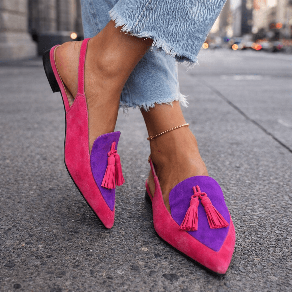 Pink and purple suede tassel sandals with decorative tassels and ankle chain