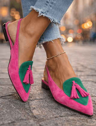 Pink suede tassel sandals with green and contrasting panel accents and ankle chain